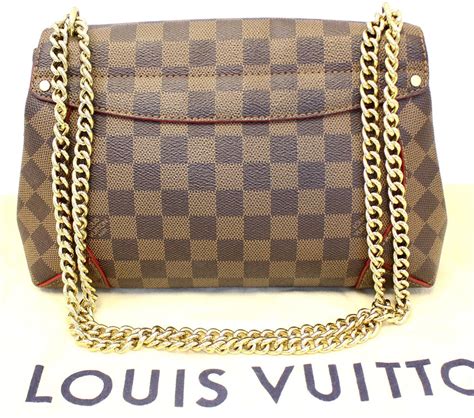 caissa clutch louis vuitton